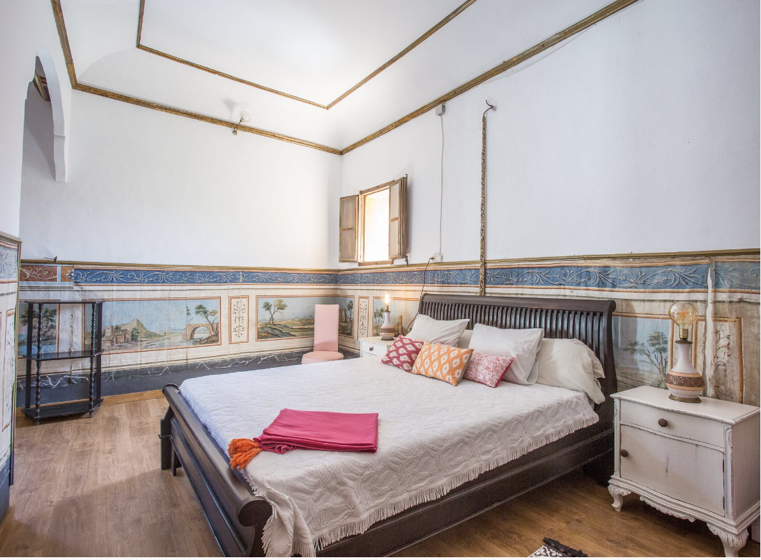 Guest room with stone walls and natural textures